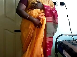 desi  indian horny tamil telugu kannada malayalam hindi hotwife wife vanitha dressed in orange colour saree  showing huge milk cans and shaved pussy press hard milk cans press nip fumbling pussy masturbation