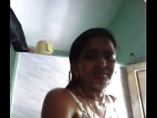 Indian dame taking self video when bathing